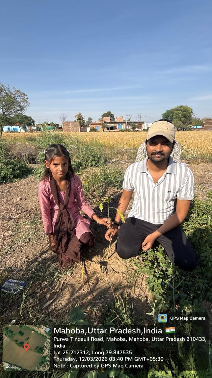 “My Plant, My Responsibility” — a student plants and adopts a sapling at Salarpur, Uttar Pradesh. Every planting is GPS-stamped so survival can be tracked.