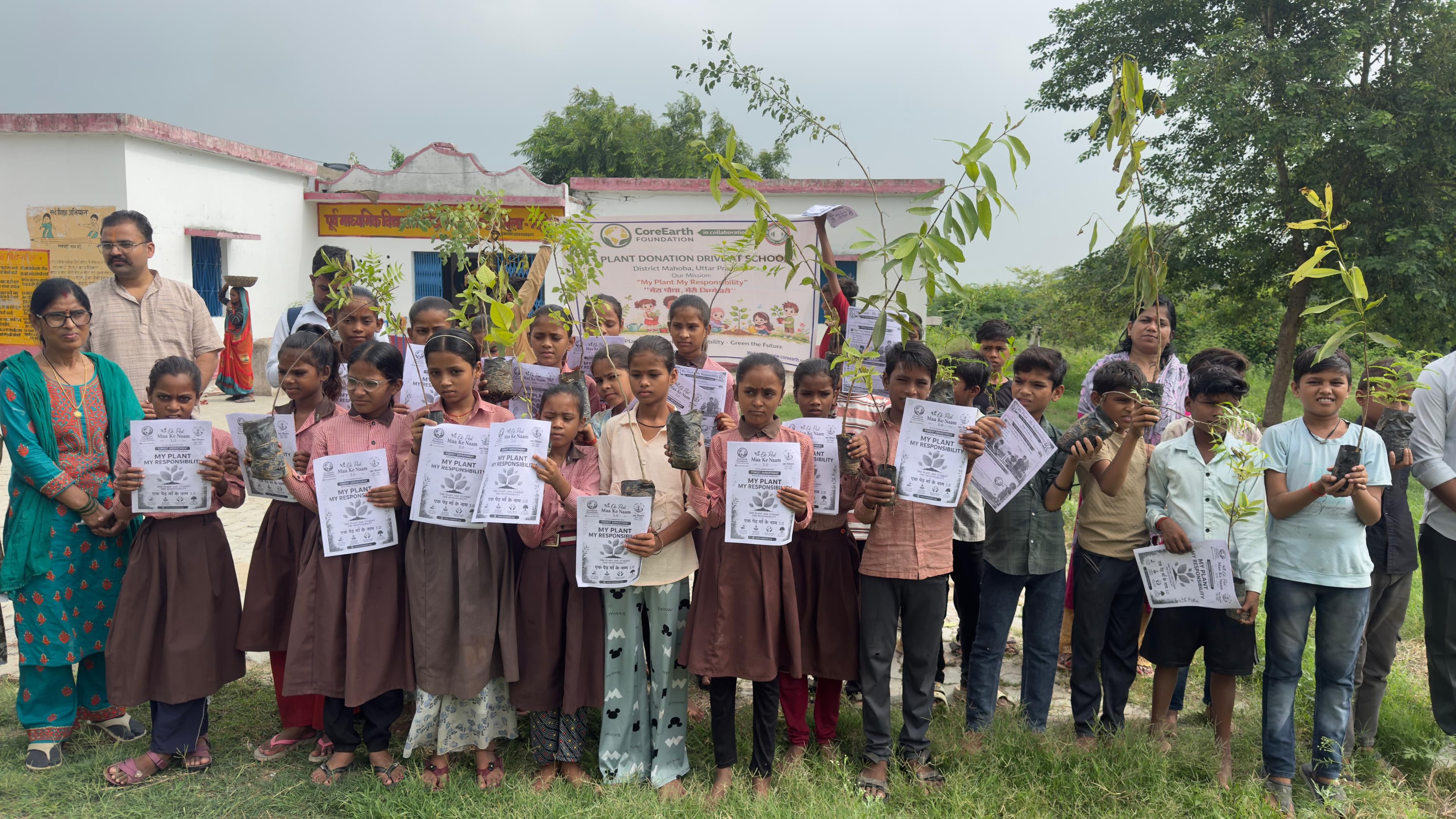 Plant Donation Drive at a school in District Mahoba — every student receives a sapling to care for as their own.